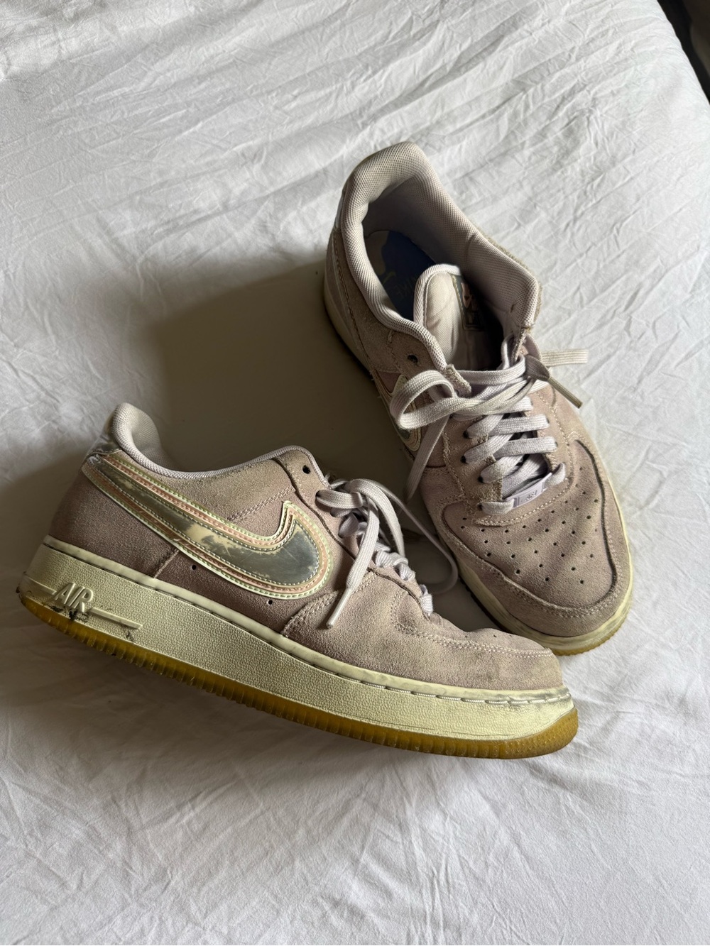 Nike Women's Pale Pink/Purple Suede Sneakers with Iridescent Swoosh